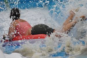 Ilminster Town FC fun day Part 35 – July 9, 2016: A giant water slide was the star attraction at a family fun day held to celebrate Ilminster Town Football Club’s new Archie Gooch Pavilion headquarters in Britten’s Field. Photo 2