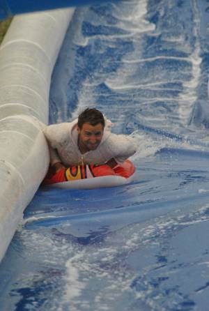 Ilminster Town FC fun day Part 35 – July 9, 2016: A giant water slide was the star attraction at a family fun day held to celebrate Ilminster Town Football Club’s new Archie Gooch Pavilion headquarters in Britten’s Field. Photo 28