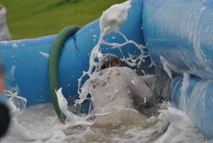 Ilminster Town FC fun day Part 35 – July 9, 2016: A giant water slide was the star attraction at a family fun day held to celebrate Ilminster Town Football Club’s new Archie Gooch Pavilion headquarters in Britten’s Field. Photo 33