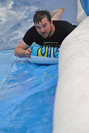 Ilminster Town FC fun day Part 35 – July 9, 2016: A giant water slide was the star attraction at a family fun day held to celebrate Ilminster Town Football Club’s new Archie Gooch Pavilion headquarters in Britten’s Field. Photo 34