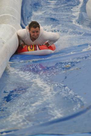 Ilminster Town FC fun day Part 35 – July 9, 2016: A giant water slide was the star attraction at a family fun day held to celebrate Ilminster Town Football Club’s new Archie Gooch Pavilion headquarters in Britten’s Field. Photo 3