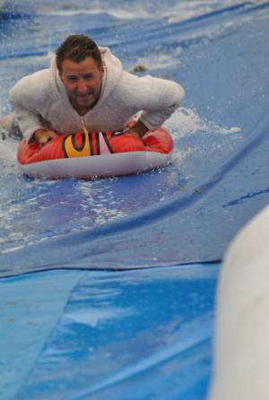 Ilminster Town FC fun day Part 35 – July 9, 2016: A giant water slide was the star attraction at a family fun day held to celebrate Ilminster Town Football Club’s new Archie Gooch Pavilion headquarters in Britten’s Field. Photo 4
