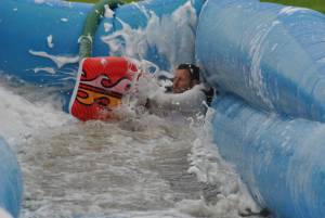 Ilminster Town FC fun day Part 35 – July 9, 2016: A giant water slide was the star attraction at a family fun day held to celebrate Ilminster Town Football Club’s new Archie Gooch Pavilion headquarters in Britten’s Field. Photo 7