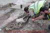 IN PHOTOS - EXCLUSIVE: Historic skeletal remains removed from hotel development site